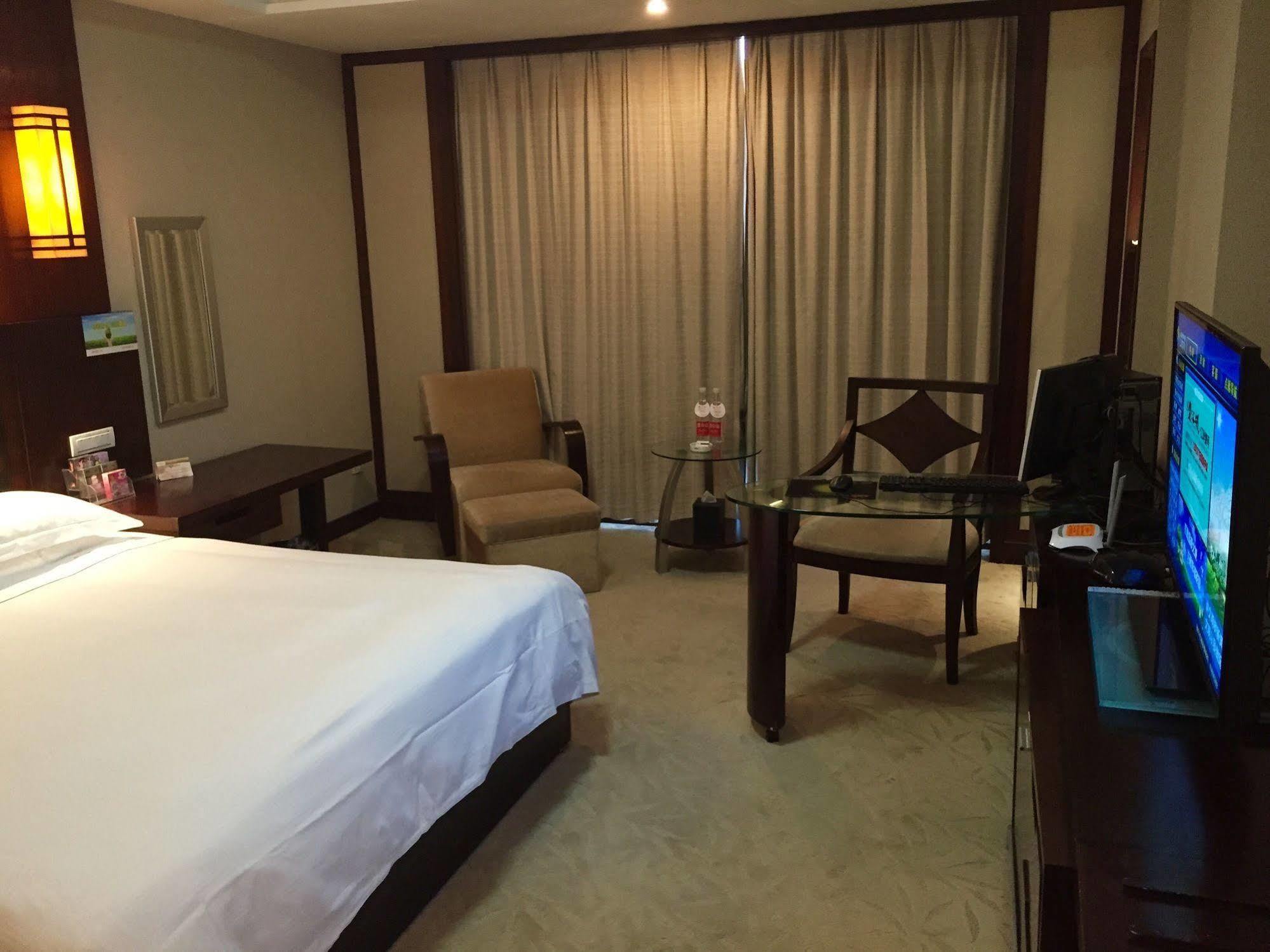 Bossman International Hotel Cixi Esterno foto