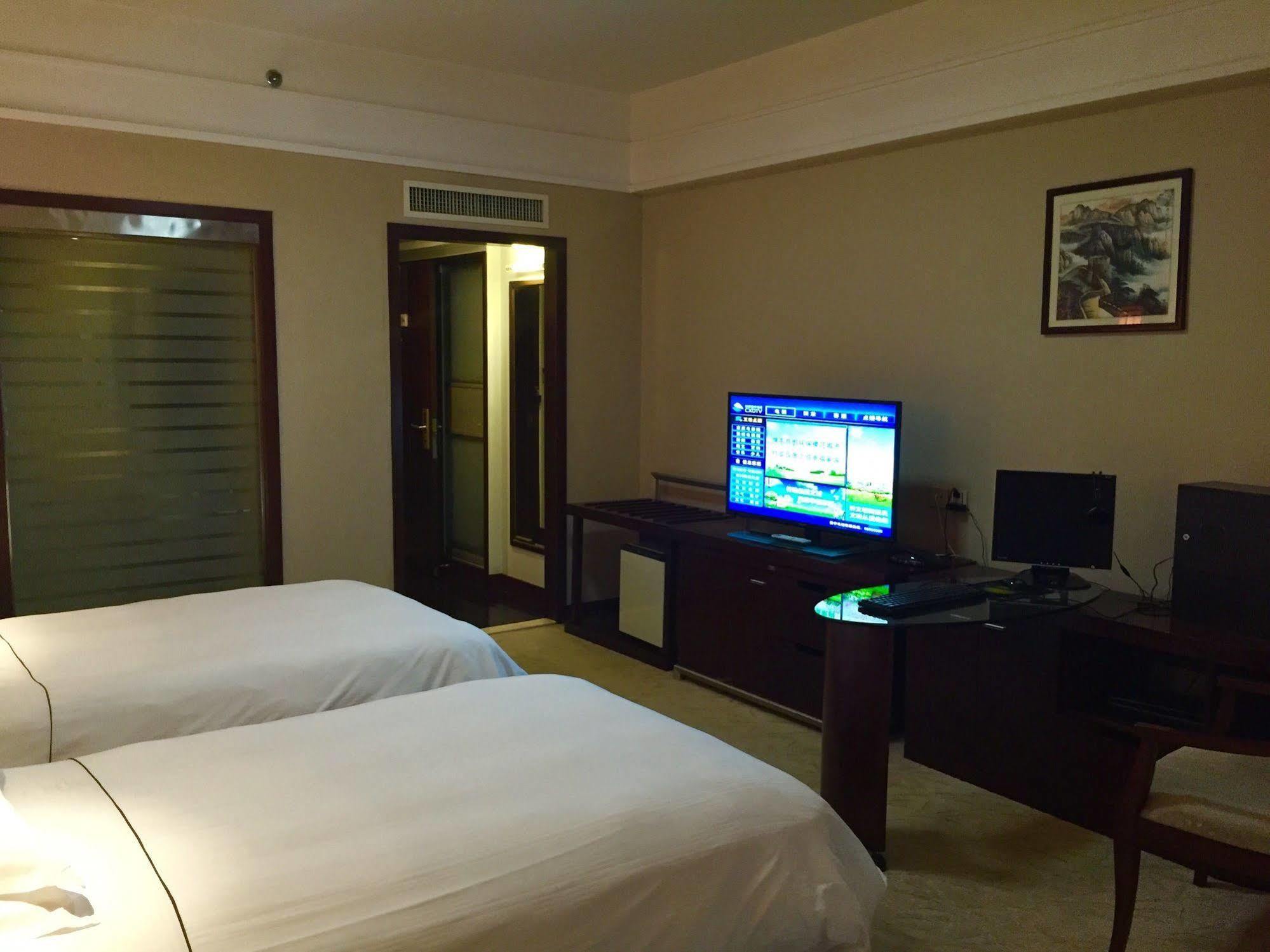 Bossman International Hotel Cixi Esterno foto