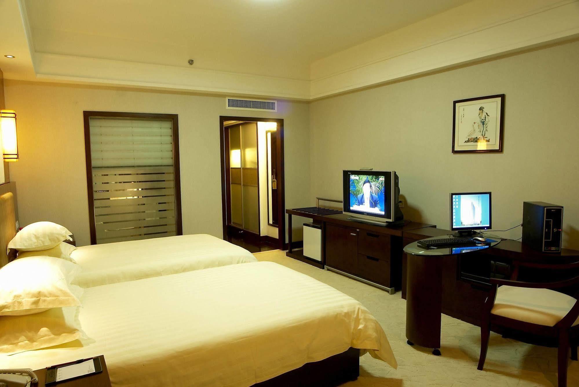 Bossman International Hotel Cixi Esterno foto